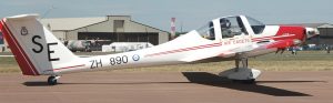 The Grob 109B motor glider, known by the RAF as the Vigilant T1, is used by the Air Cadet Organisation to give basic flying and gliding training to air cadets. The aircraft is built in Germany, but it has been modified to meet the RAFs training requirements by the inclusion of an additional throttle in the cockpit and an increase in the maximum take-off weight. The Vigilant is currently used by 16 Volunteer Gliding Squadrons (VGSs), located at various sites around the UK. Their role is to train air cadets in basic flying techniques and to enable them to reach a standard where they are able to fly solo. Courses available to the air cadets are the gliding induction course, the gliding scholarship course and the advanced gliding training course. The Vigilant T1 aircraft is also used at the Air Cadet Central Gliding School, at Syerston, in Nottinghamshire, where it is used to train the VGS instructors.